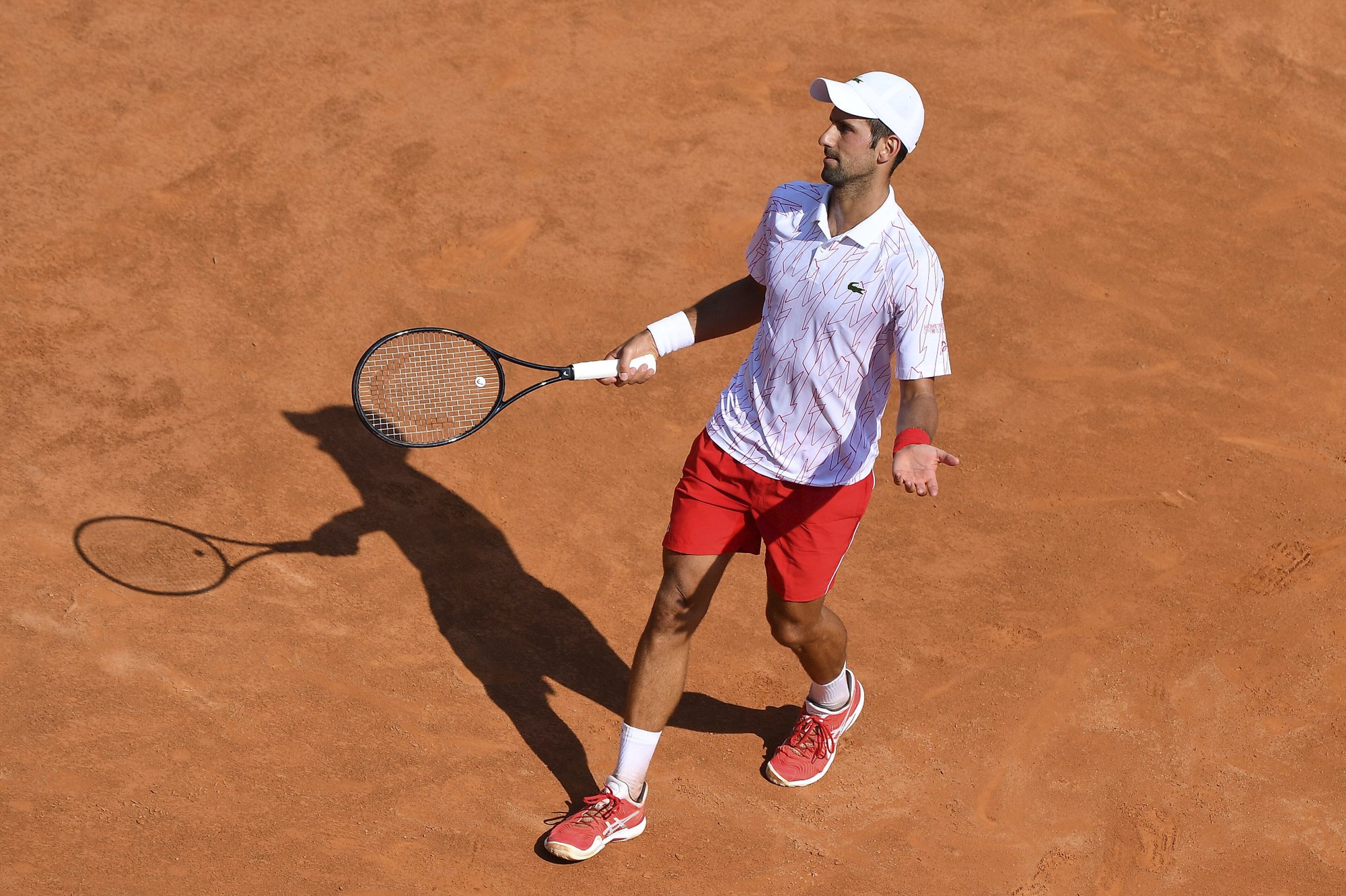 combine Ten years bright Djokovic behaves better in 1st match since US Open default | AP News
