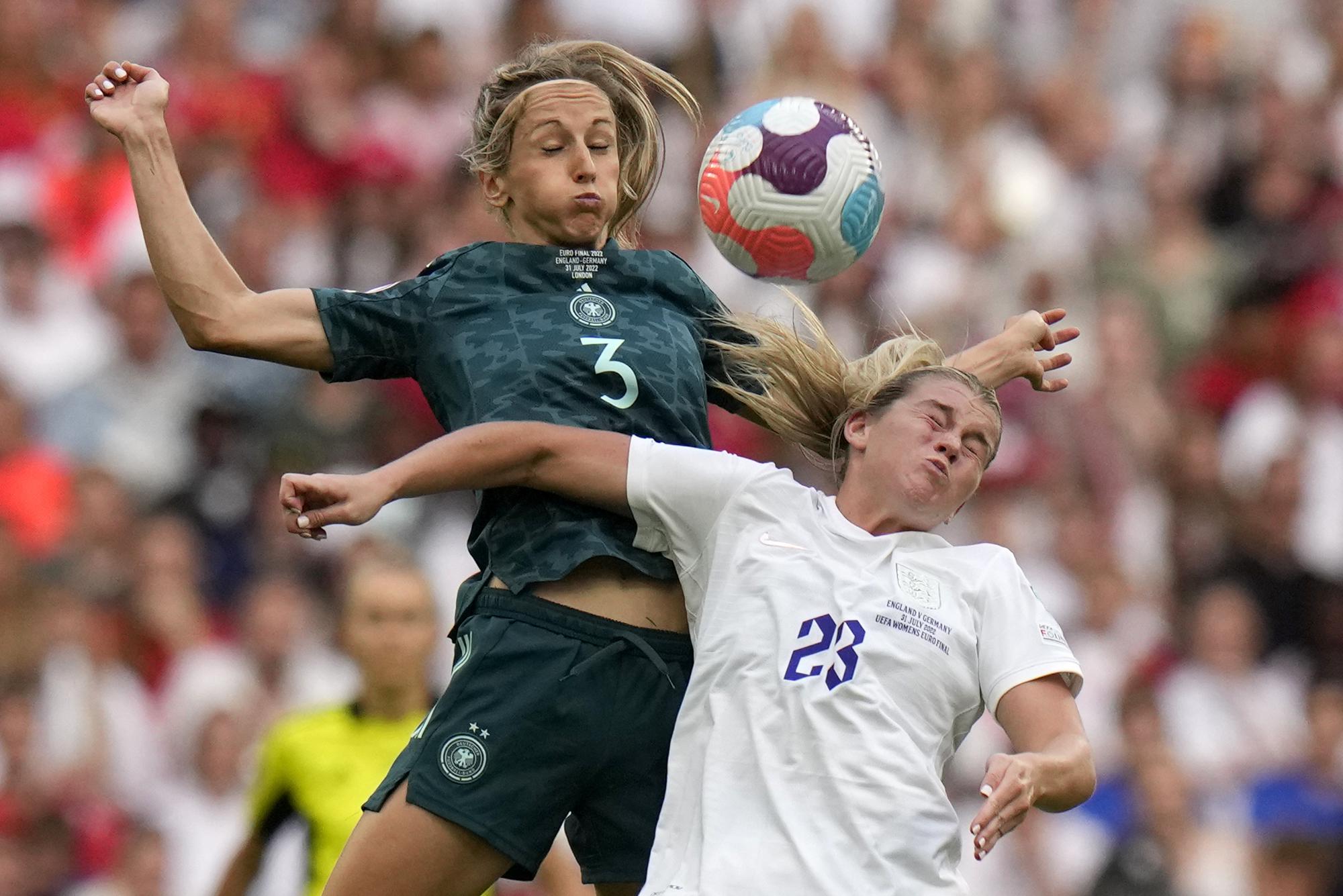 FILE - England's Alessia Russo, right, vies for the ball with Germany's Kathrin-Julia Hendrich during the Women's Euro 2022 final soccer match between England and Germany at Wembley stadium in London, Sunday, July 31, 2022. (AP Photo/Alessandra Tarantino, File)