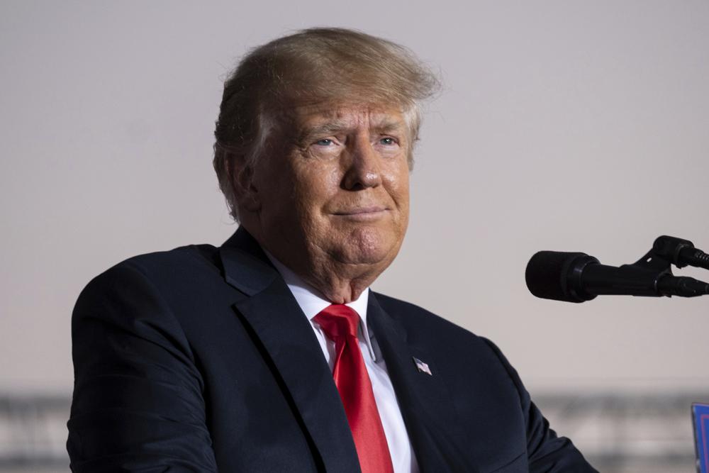 FILE - Former President Donald Trump speaks during a rally in Perry, Ga., on Sept. 25, 2021. As Trump's lawyers try to block the White House from releasing records to the congressional committee investigating the Jan. 6 Capitol insurrection, the former president faces a flurry of other investigations that could come to a head in the coming weeks and the new year. That includes two major state criminal investigations — one in New York and one in Georgia — and lawsuits concerning sexual assault allegations, a fight over an inheritance and questions of whether he should be held personally liable for inciting the insurrection. (AP Photo/Ben Gray, File)