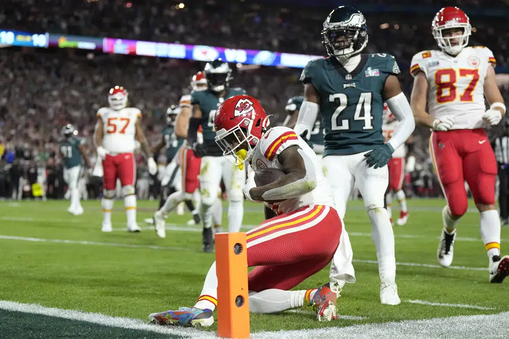 Kansas City Chiefs running back Jerick McKinnon, foreground, stops short of the goal line on a run against the Philadelphia Eagles during the second half of the NFL Super Bowl 57 football game, Sunday, Feb. 12, 2023, in Glendale, Ariz. (AP Photo/Ashley Landis)