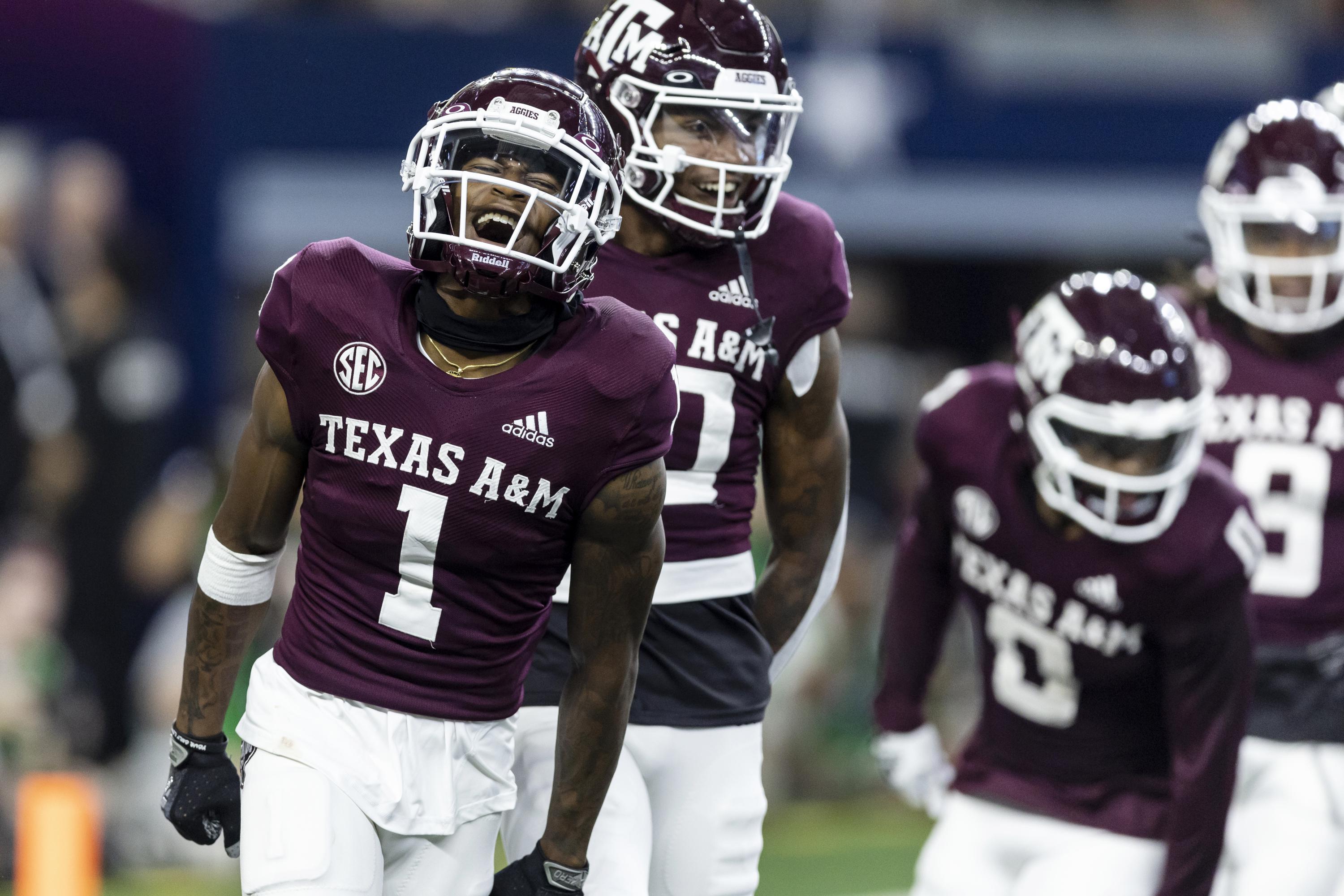 Achane leads No. 23 Texas A&M past No. 10 Arkansas, 2321 AP News