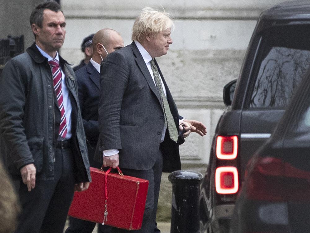 Britain's Prime Minister Boris Johnson leaves Downing Street in London, Friday Dec. 17, 2021. U.K. Prime Minister Boris Johnson’s Conservative Party has suffered a stunning defeat in North Shropshire in a parliamentary by-election that was a referendum on his government amid weeks of scandal and soaring COVID-19 infections. (Joshua Bratt/PA via AP)