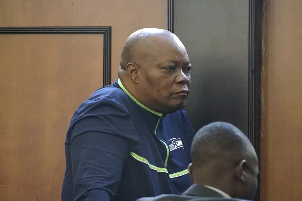Job Sikhala, a member of Parliament and senior official in the main opposition Citizens Coalition for Change party, is seen inside the court following his conviction in Harare, Wednesday, May 3, 2023. Sikhala who had been detained for nearly 10 months was convicted Wednesday of obstructing the course of justice for recording a video of himself accusing ruling party supporters of killing and dismembering an activist and then posting the video to social media. (AP Photo/Thandiwe Garusa)