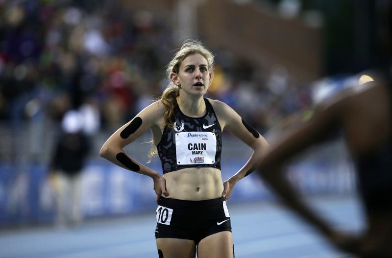 FILE - In this April 29, 2016, file photo, Mary Cain walks off the track after competing in the women's special 1500-meter run at the Drake Relays athletics meet in Des Moines, Iowa. Distance runner Mary Cain, whose career fizzled after what she has called four miserable years at the Nike Oregon Project, has filed a $20 million lawsuit against her former coach, Alberto Salazar, and their employer, Nike, Monday, Oct. 11, 2021. (AP Photo/Charlie Neibergall, File)