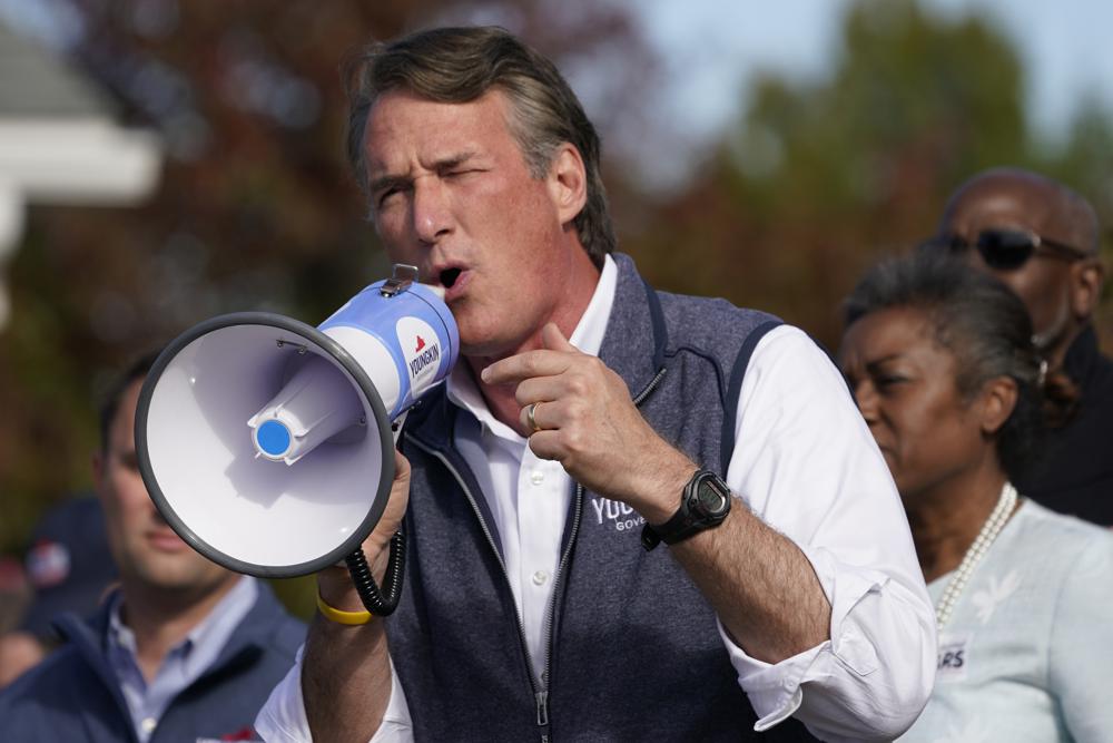 Republican gubernatorial candidate Glenn Youngkin speaks to supporters during a rally in Fredericksburg, Va., Saturday, Oct. 30, 2021. Youngkin will face Democrat former Gov. Terry McAuliffe in the November election. (AP Photo/Steve Helber)