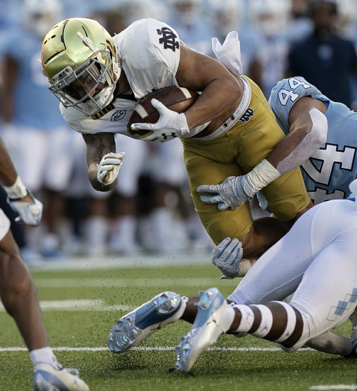 Ian Book, defense help No. 2 Notre Dame beat No. 25 UNC 31-17