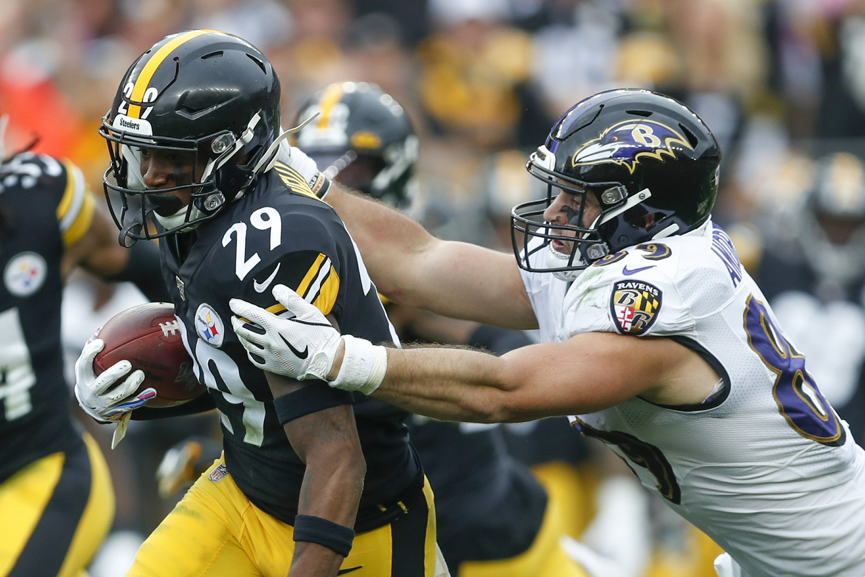 The Latest: Steelers' Rudolph exits game after hit to head