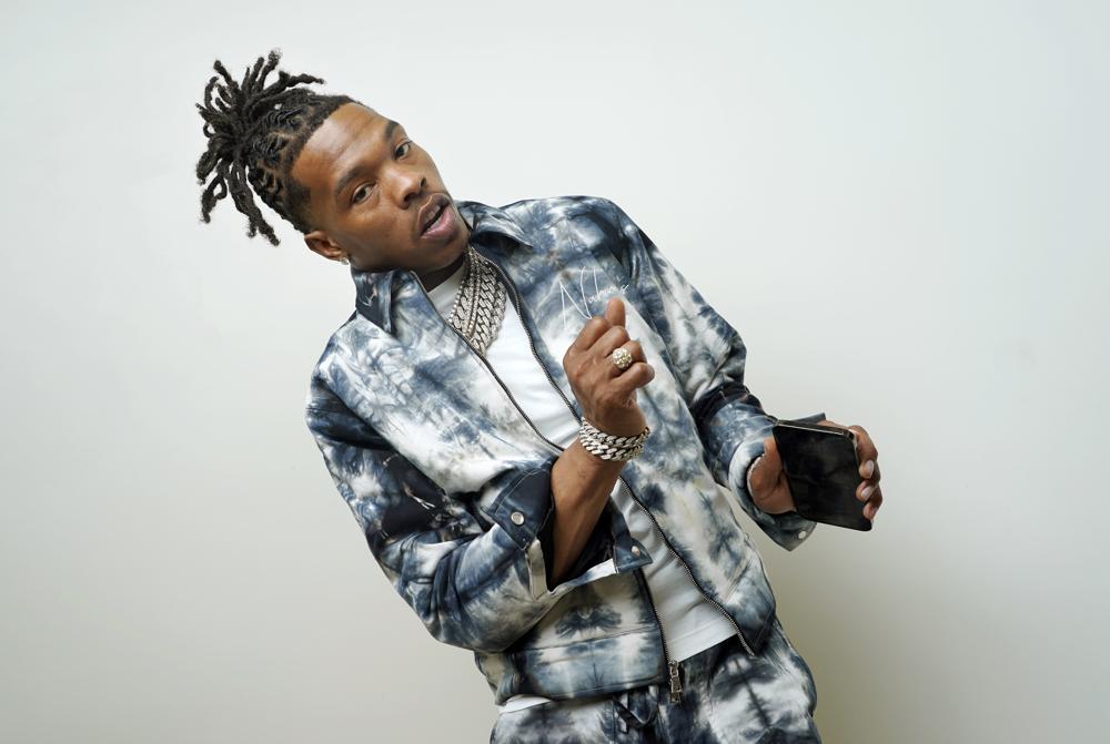 Rapper Lil Baby dances during a portrait session on Wednesday, Oct. 5, 2022, in Los Angeles to promote his third studio album “It’s Only Me." (AP Photo/Chris Pizzello)
