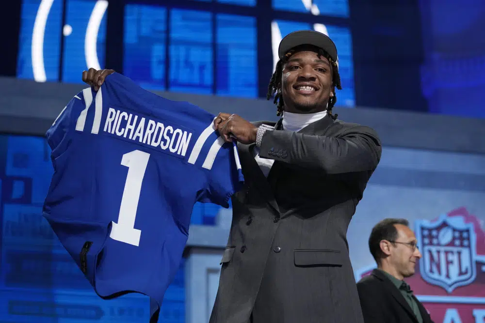 Florida quarterback Anthony Richardson reacts after being chosen by the Indianapolis Colts with the fourth overall pick during the first round of the NFL football draft, Thursday, April 27, 2023, in Kansas City, Mo. (AP Photo/Jeff Roberson)