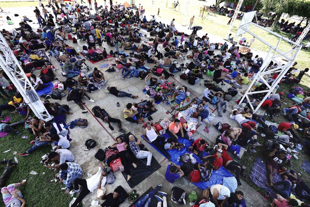 A caravan of migrants, mostly from Central America, heading north, stop to rest in the Alvaro Obregon community, Tapachula municipality, Chiapas state, Mexico, Saturday, Oct. 23, 2021.  (AP Photo/Marco Ugarte)