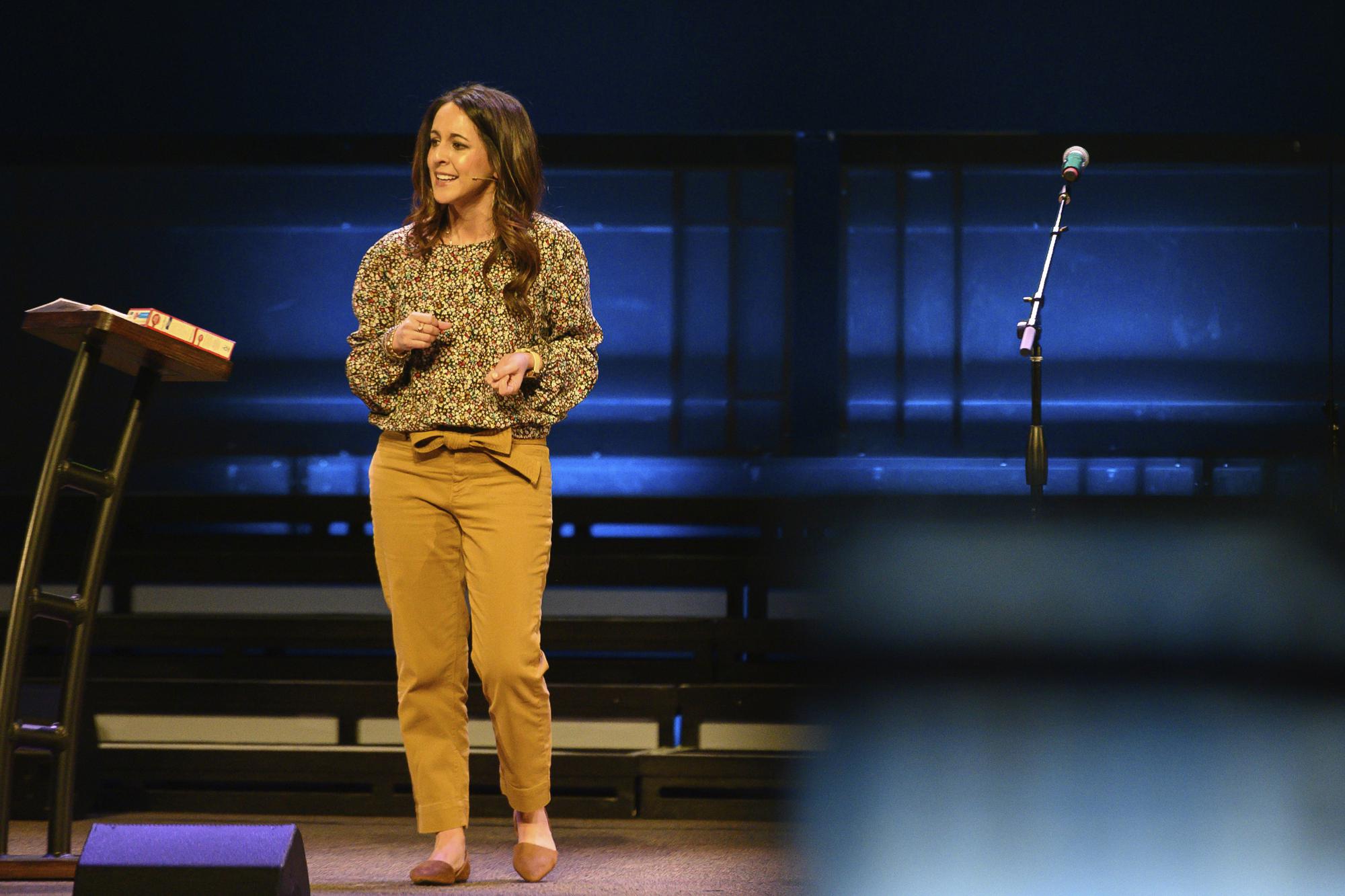 female pastor preaching