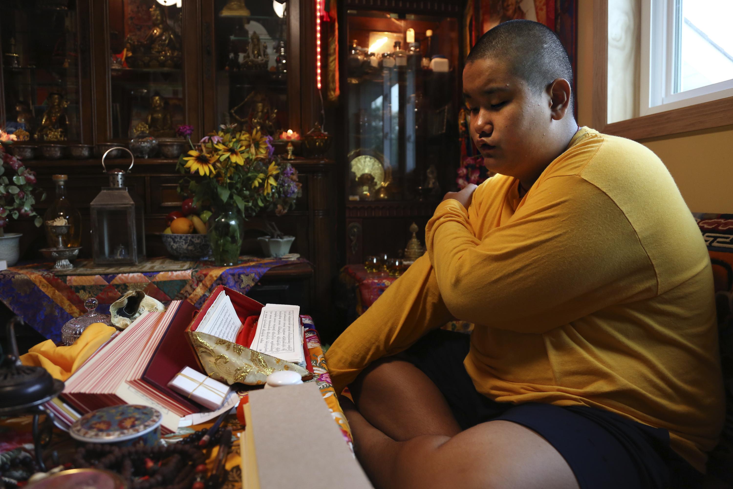 For US teen Buddhist lama, itâ€™s faith, school, football