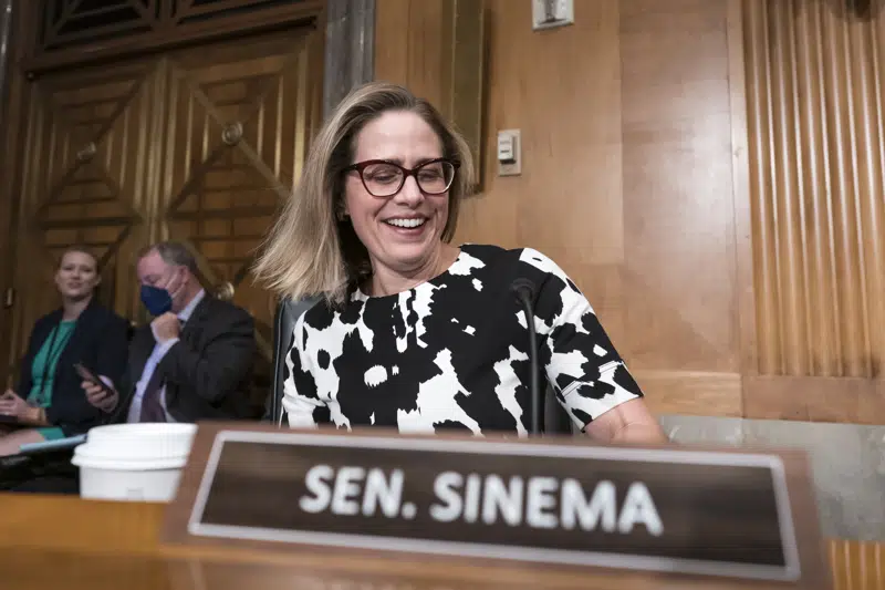 FILE - Sen. Kyrsten Sinema, D-Ariz., arrives for a meeting of the Senate Homeland Security Committee at the Capitol in Washington, Aug. 3, 2022. Sinema won Democrats a Senate seat from Arizona for the first time in a generation thanks in no small part to unity in her party and division among Republicans. Since then, Democrats have picked up the other Senate seat and won the top three state offices. But that winning formula is in jeopardy because of Sinema's estrangement and divorce from the Democratic Party, a situation that could complicate President Joe Biden's path to reelection and the party's hopes for maintaining control of the Senate. (AP Photo/J. Scott Applewhite, File)