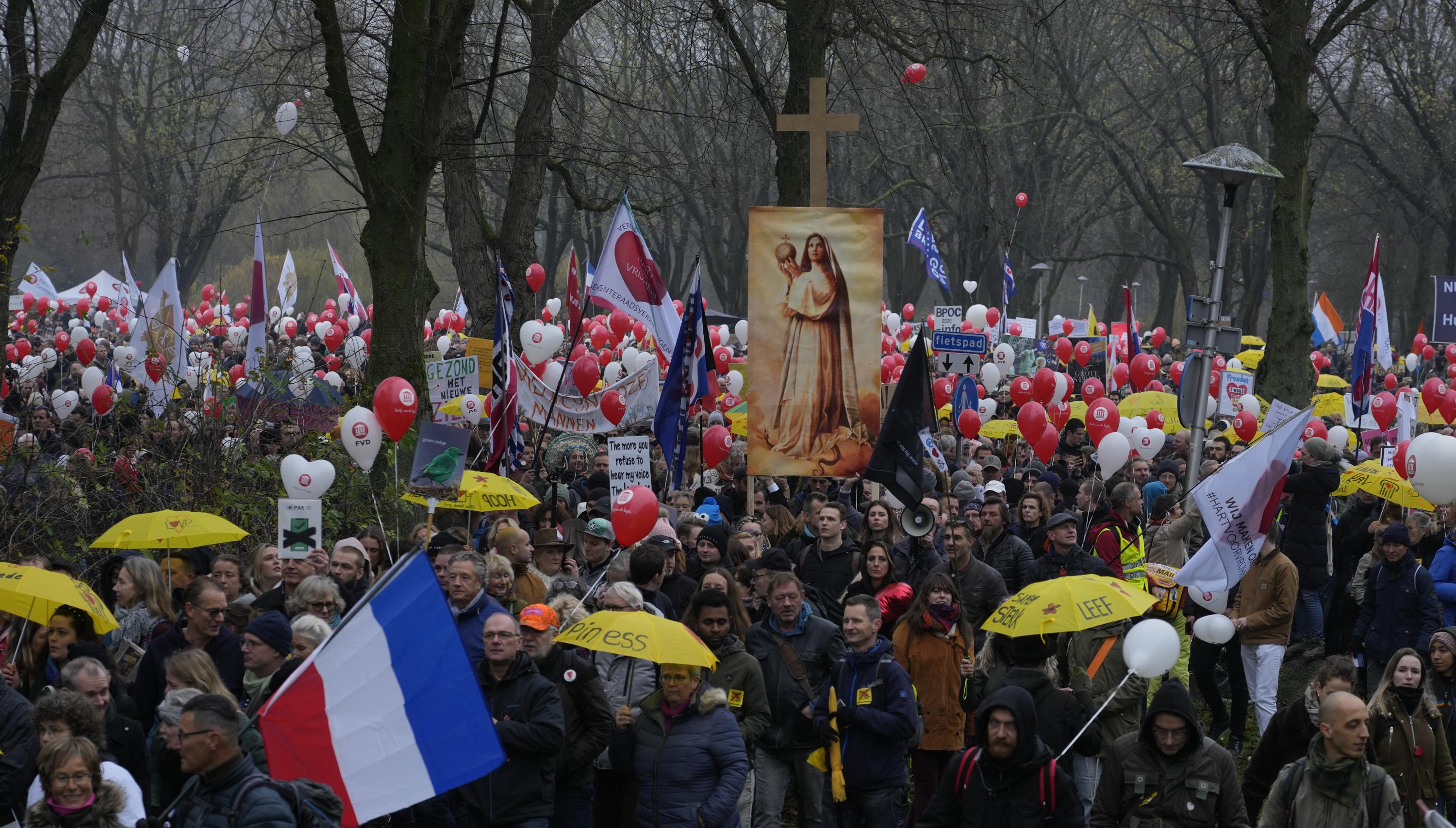 Anti-lockdown protesters march through Dutch city of Utrecht | AP News