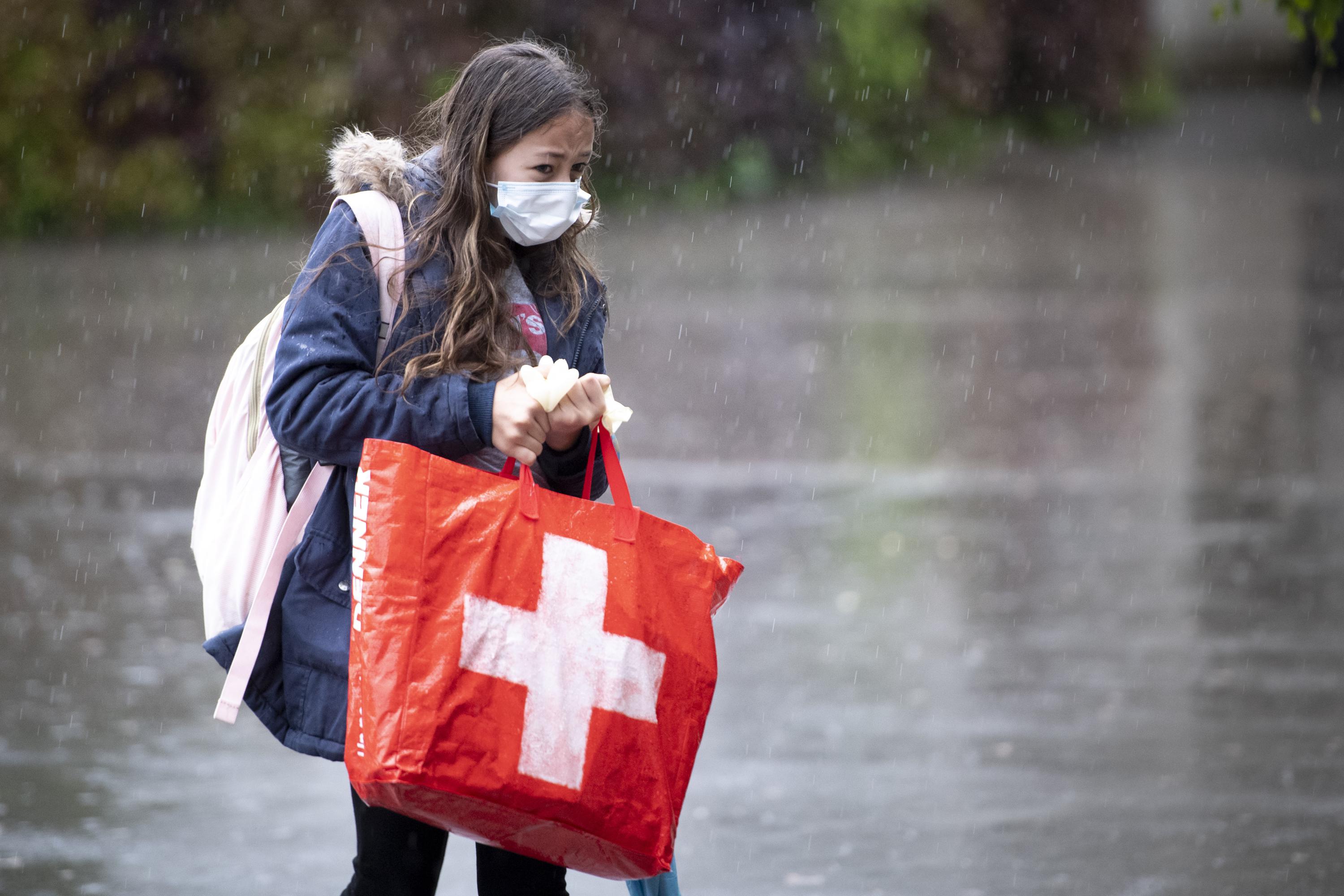 swiss-vote-on-covid-law-amid-sharp-rise-in-infections-ap-news