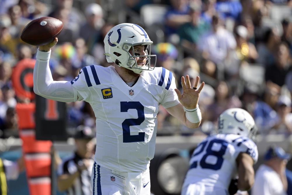 FILE - Indianapolis Colts quarterback Carson Wentz (2) throws a pass against the Jacksonville Jaguars during the first half of an NFL football game, Sunday, Jan. 9, 2022, in Jacksonville, Fla. The Washington Commanders have agreed to acquire quarterback Carson Wentz from the Indianapolis Colts, according to a person with direct knowledge of the situation. The person spoke to The Associated Press on condition of anonymity Wednesday, March 9, 2022, because the deal cannot be finalized until the start of the new league year next week. (AP Photo/Phelan M. Ebenhack, File)