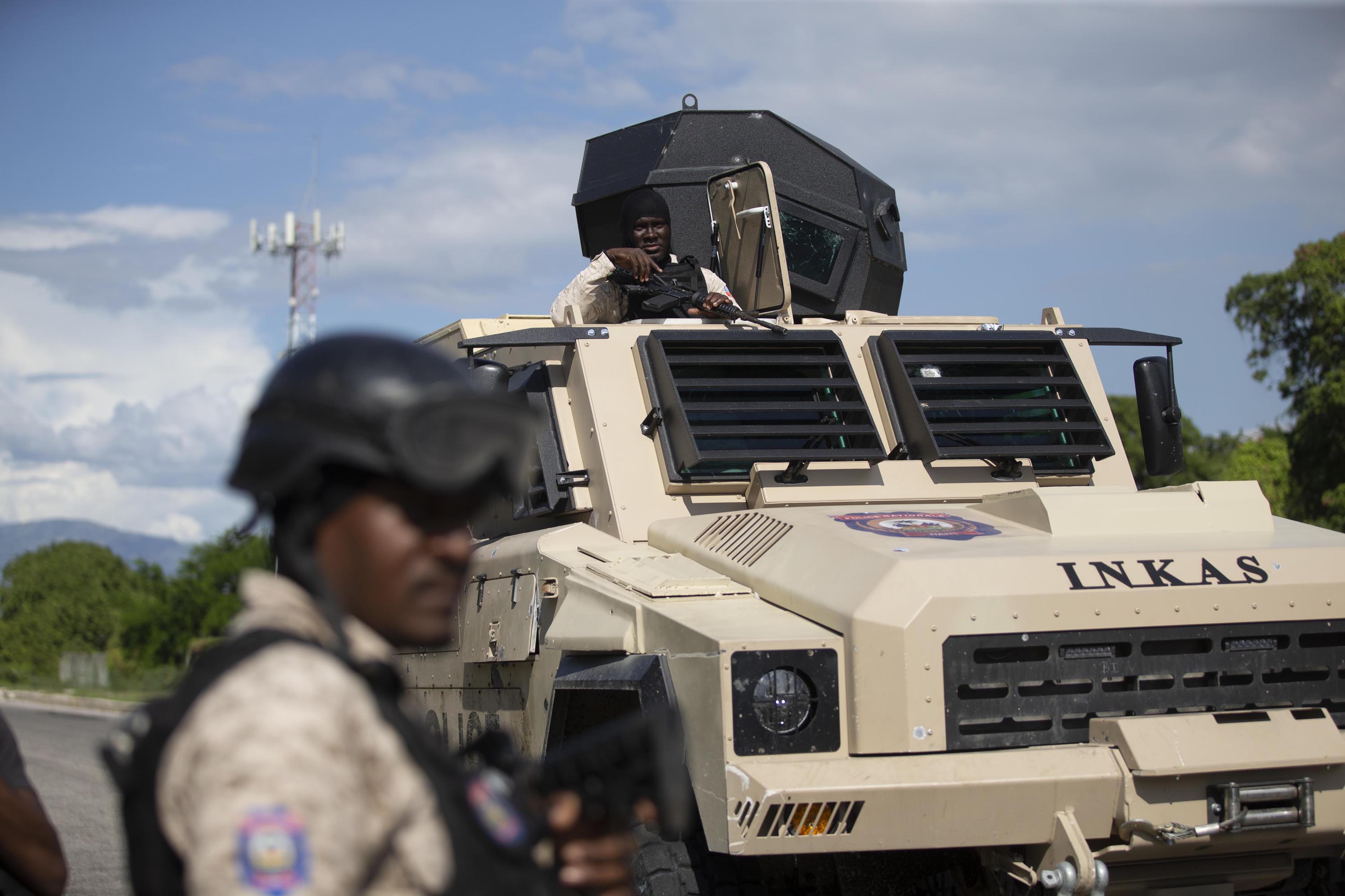 Haitian police briefly lose control of armored car | AP News