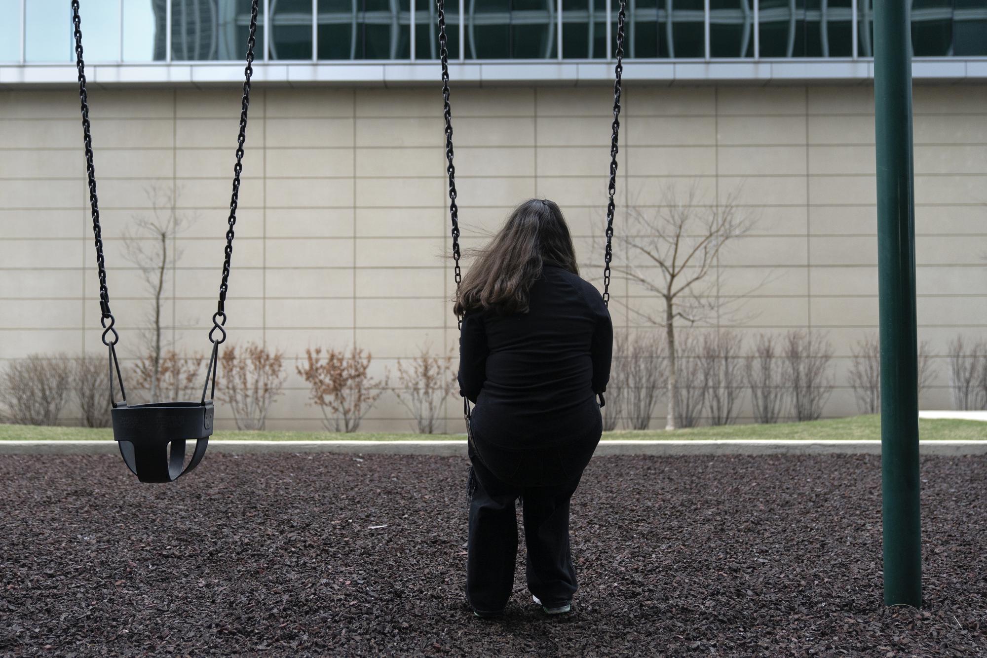 Amelia, 16, sits for a portrait in a park near her home in Illinois on Friday, March 24, 2023. “We are so strong and we go through so, so much," says the teenage girl who loves to sing and wants to be a surgeon. Amelia has also faced bullying, toxic friendships, and menacing threats from a boy at school who said she “deserved to be raped." (AP Photo Erin Hooley)