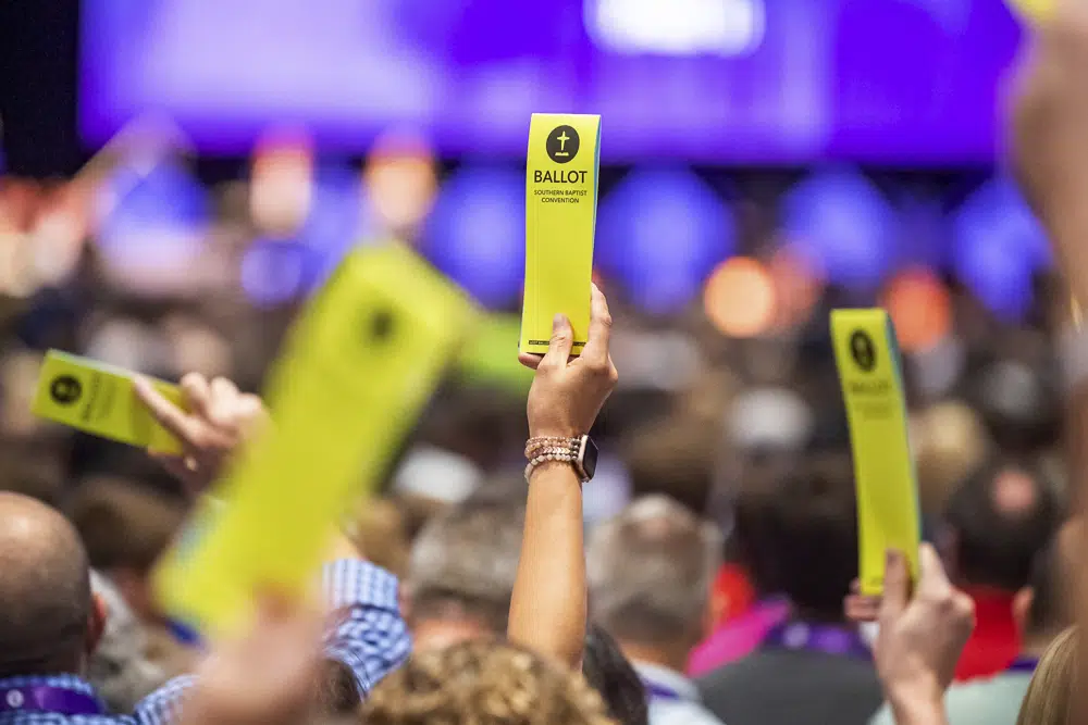 Delegates hold up their ballots at the Southern Baptist Convention at the New Orleans Ernest N. Morial Convention Center in New Orleans, Tuesday, June 13, 2023. (Scott Clause/The Daily Advertiser via AP)