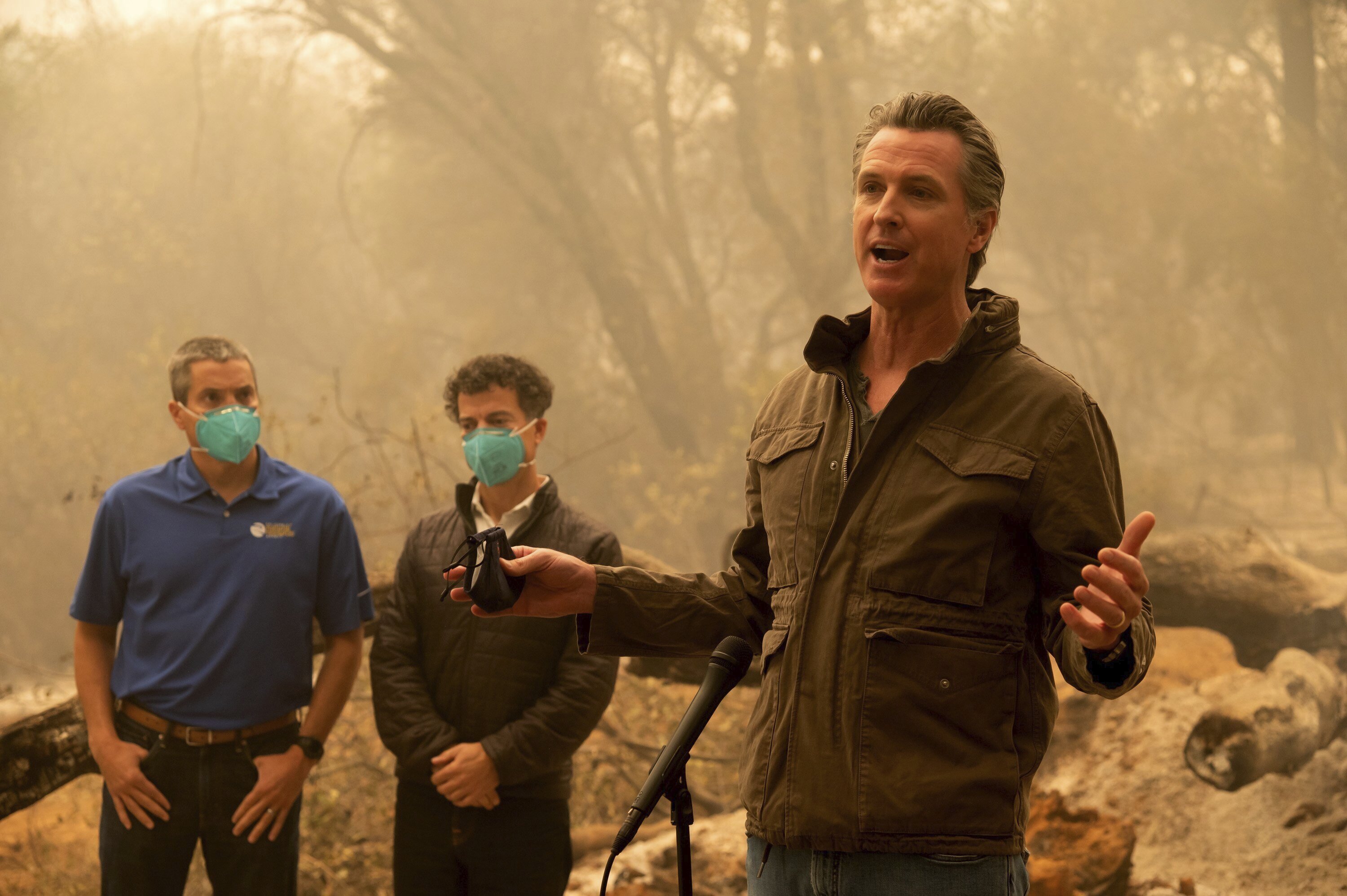 Amid ashes, California governor fires away on climate change - The Associated Press