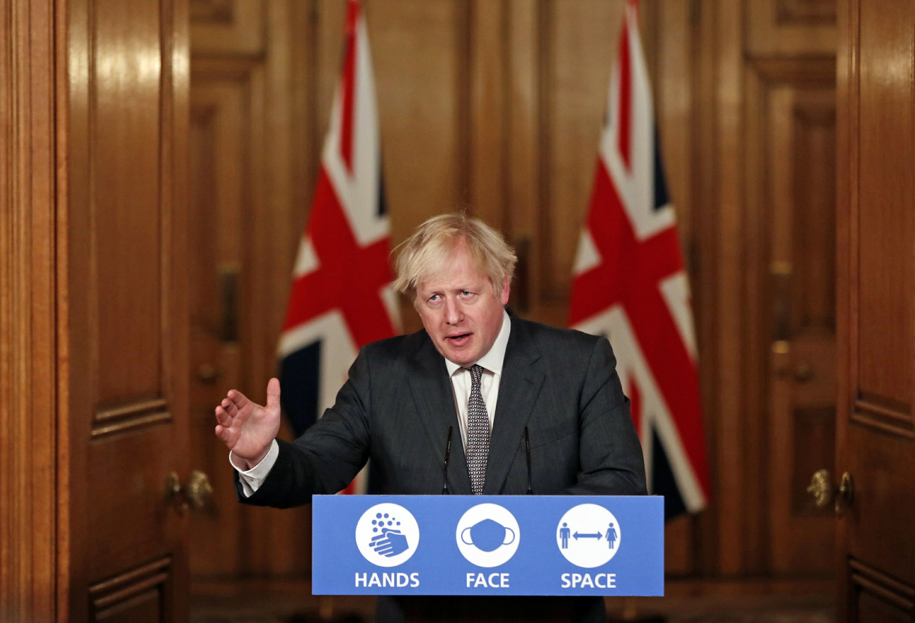 UK’s Johnson warns of more closure measures as virus rises