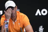 Spain's Rafael Nadal gestures during a press conference ahead of the Australian Open tennis championship in Melbourne, Australia, Saturday, Jan. 14, 2023. (AP Photo/Mark Baker)