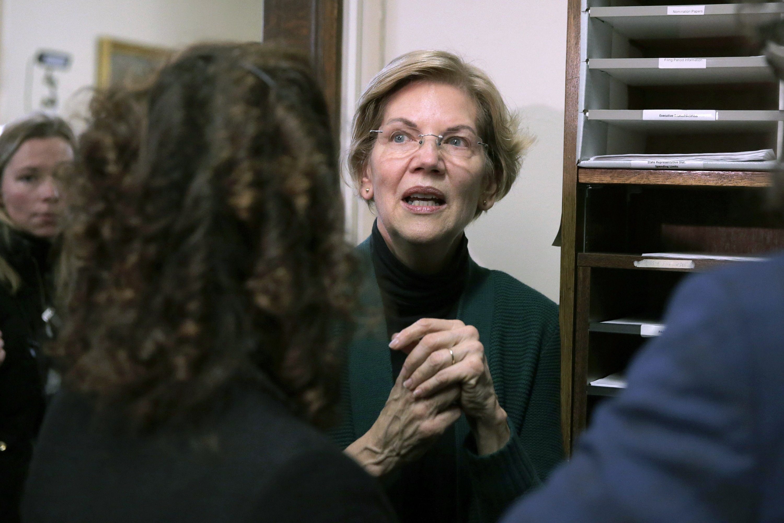 Warren says she won’t immediately push for Medicare for All