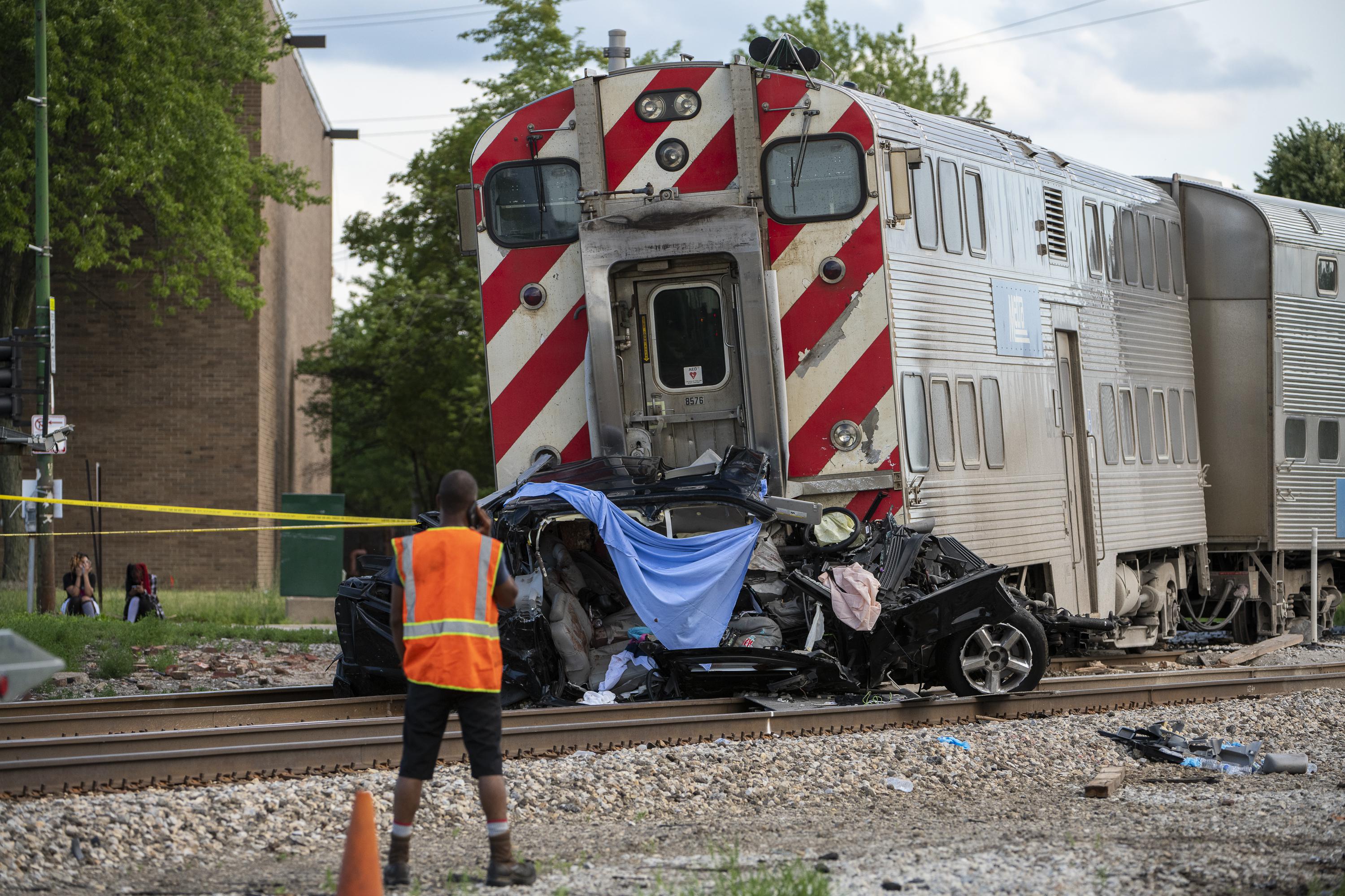 Witnesses Car struck by train in Chicago drove past gates AP News