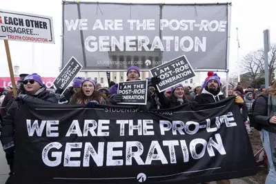 FILE - Anti-abortion activists march outside of the U.S. Supreme Court during the March for Life in Washington, Jan. 21, 2022. Anti-abortion activists will have multiple reasons to celebrate – and some reasons for unease -- when they gather Friday, Jan. 20, 2023 in Washington for the annual March for Life. The march has been held since January 1974 – a year after the U.S. Supreme Court’s Roe v. Wade decision established a nationwide right to abortion. (AP Photo/Jose Luis Magana, File)