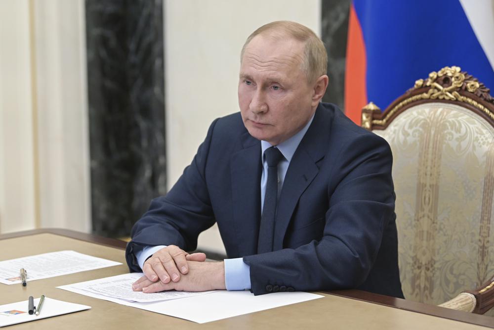 Russian President Vladimir Putin attends a meeting via teleconference call, in Moscow, Russia, Monday, Aug. 22, 2022. (Pavel Byrkin, Sputnik, Kremlin Pool Photo via AP)