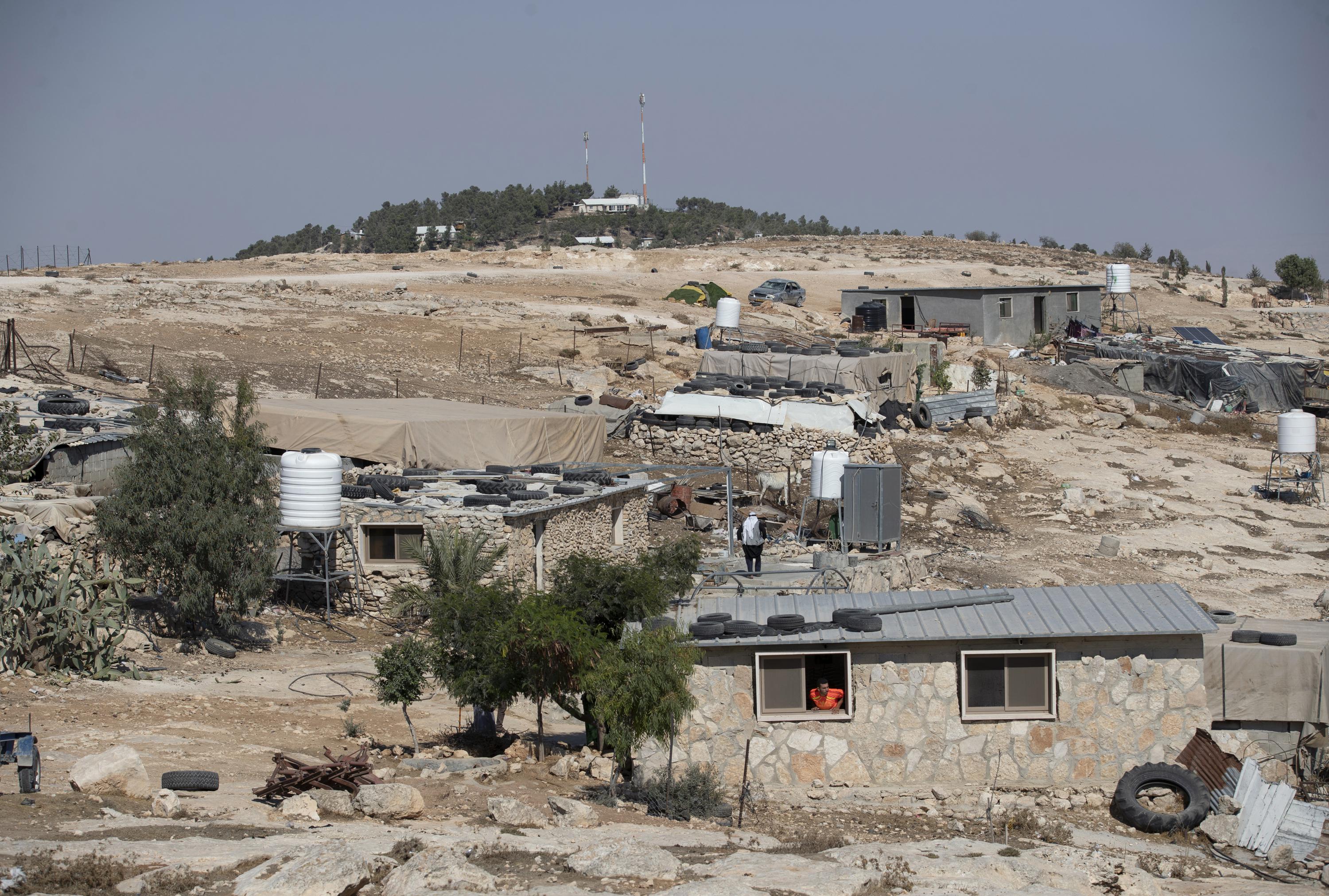 Israel OKs Palestinian homes after advancing settlements | AP News
