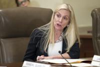 FILE- In this June 14, 2018, file photo Federal Reserve Board Governor Lael Brainard participates in an open meeting in Washington. The U.S. Senate on Tuesday, April 26, 2022 approved Brainard to a four-year term as vice chair of the Federal Reserve, elevating her to a top policymaking position in the midst of the central bank's toughest fight against inflation in four decades. (AP Photo/Cliff Owen, File)