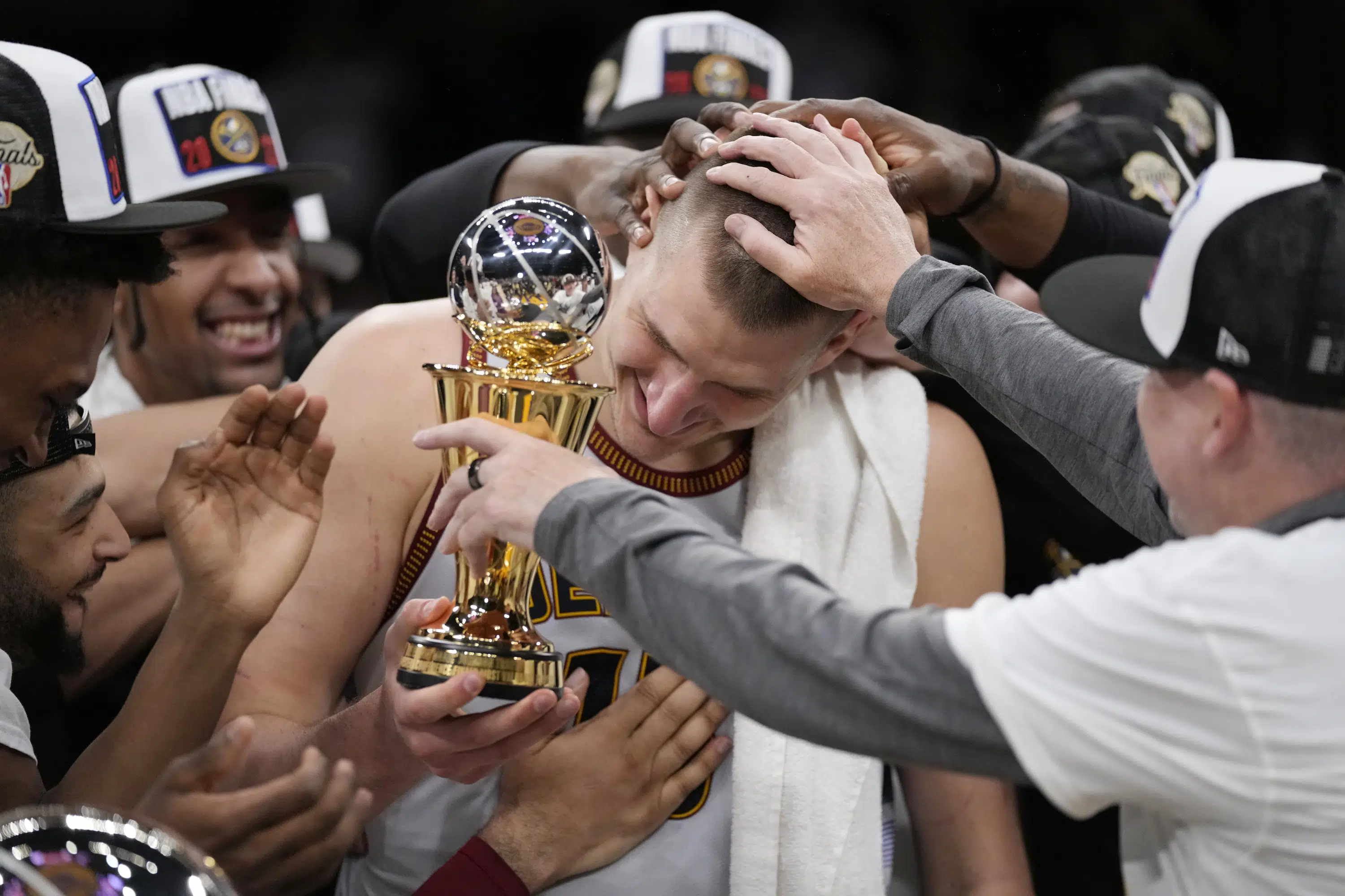 Nuggets shaking off team history, staking claim for first NBA title