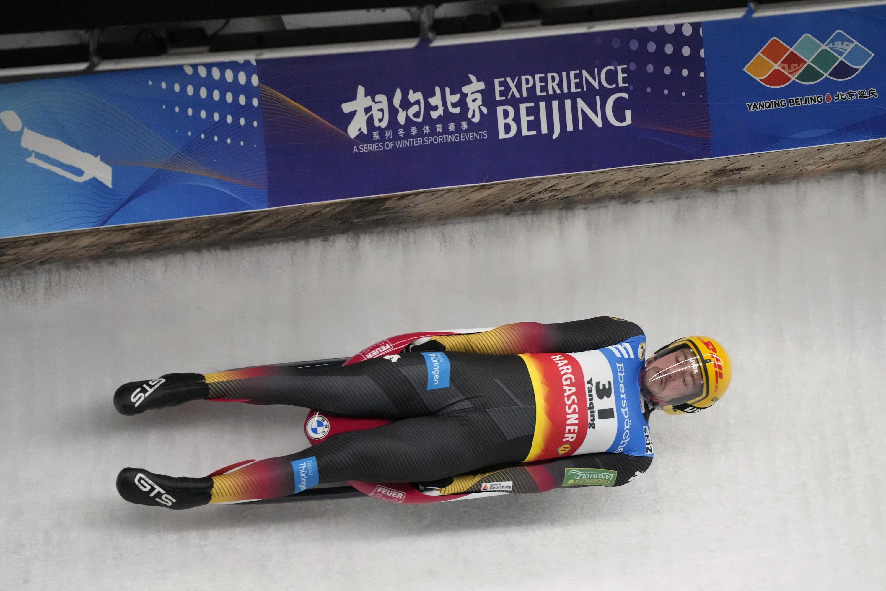 Ludwig wins odd World Cup luge race on a warm day in Russia AP News