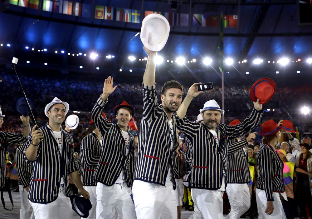 FILE - Team Czech Republic arrives during the opening ceremony for the Summer Olympics in Rio de Janeiro, Brazil on Aug. 5, 2016. Olympic gear makes for lively social media fodder, starting with the hours-long Parade of Nations. The year's wait due to the pandemic has given enthusiasts extra time to ponder what they love or hate. There's the Czech Republic and its "Beetlejuice" stripes in Rio 2016. (AP Photo/David J. Phillip, File)