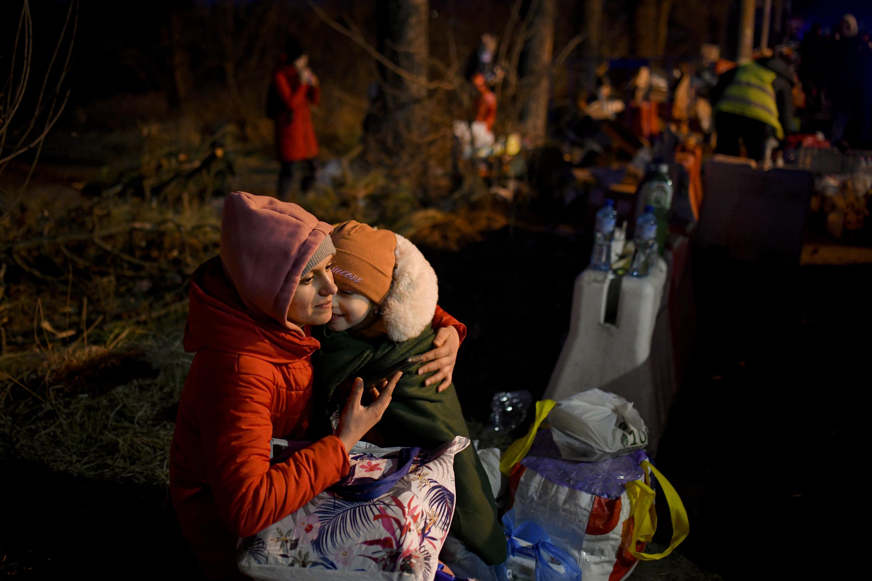 Ukrainians flee war, seeking safety across western borders | AP News