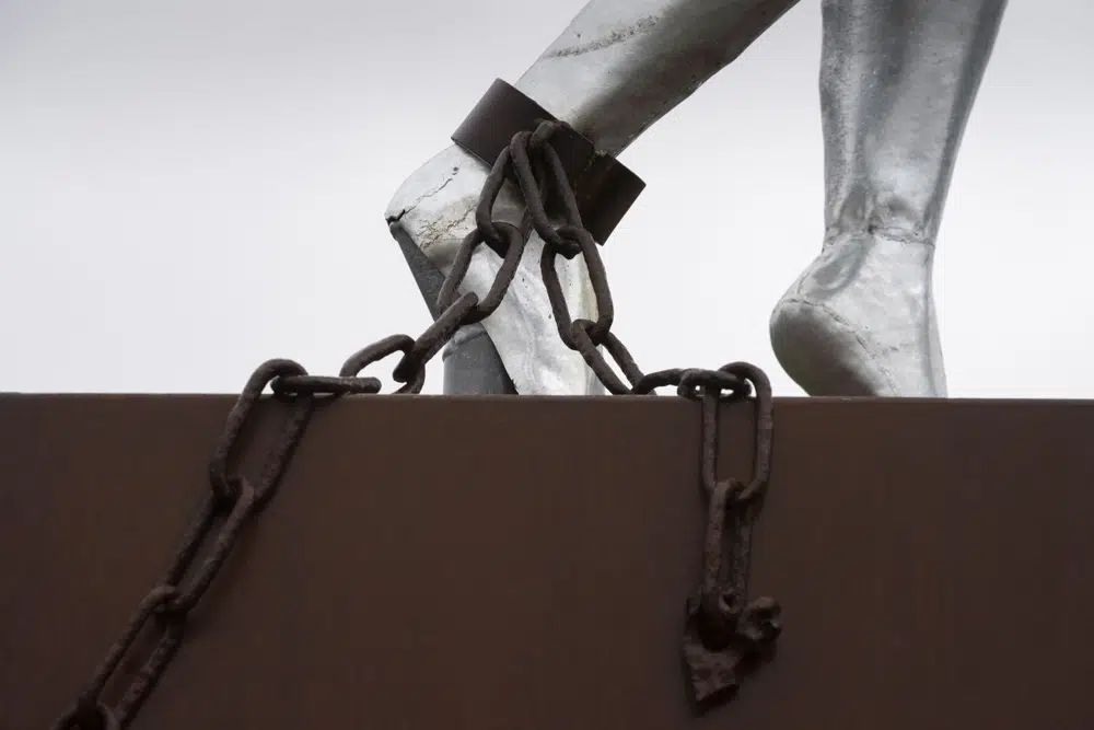 Clave, Monument for Slavery, by Alex da Silva, is seen in Rotterdam, Netherlands, Monday, Dec. 19, 2022. The Dutch government is expected to issue a long-awaited formal apology for its role in the slave trade, with a speech by Dutch Prime Minister Mark Rutte, and ceremonies in the former colonies. (AP Photo/Peter Dejong)