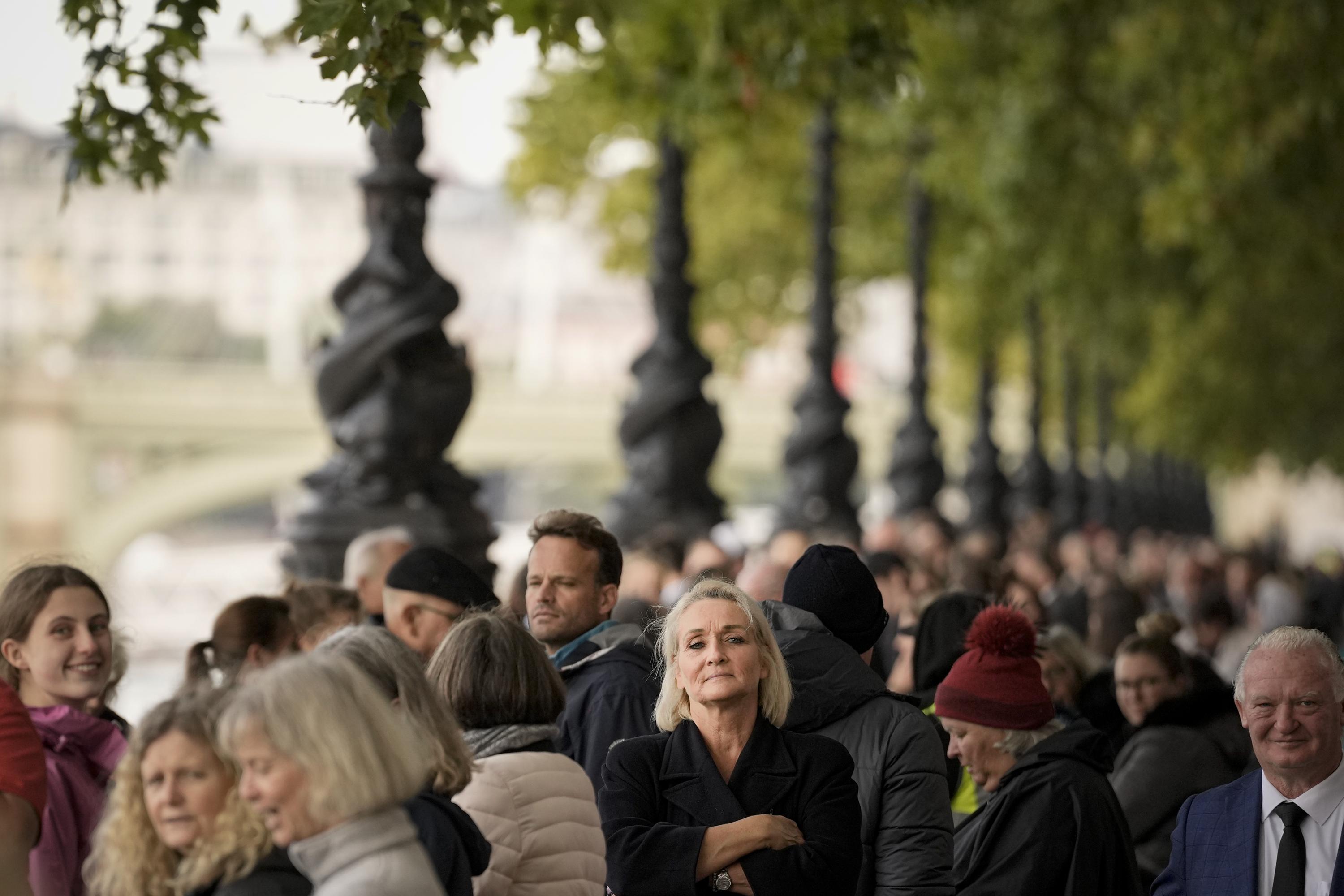 Huge line to view monarch’s coffin is queue fit for a queen