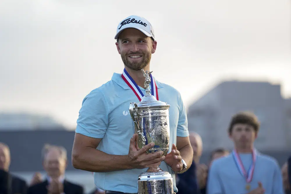 Wyndham Clark holds the holds the trophy after winning the U.S. Open golf tournament at Los Angeles Country Club on Sunday, June 18, 2023, in Los Angeles. (AP Photo/George Walker IV)