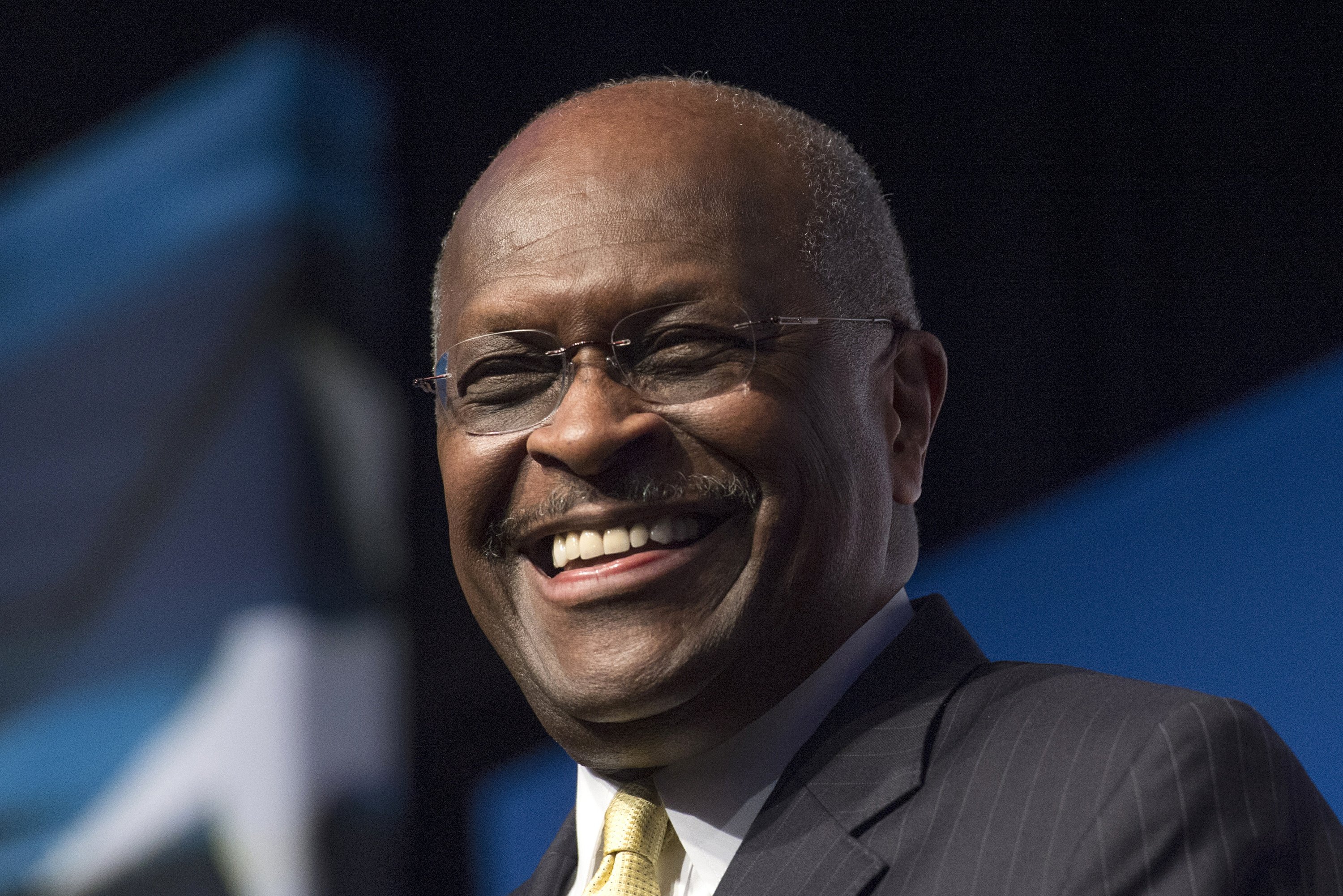 herman cain award website