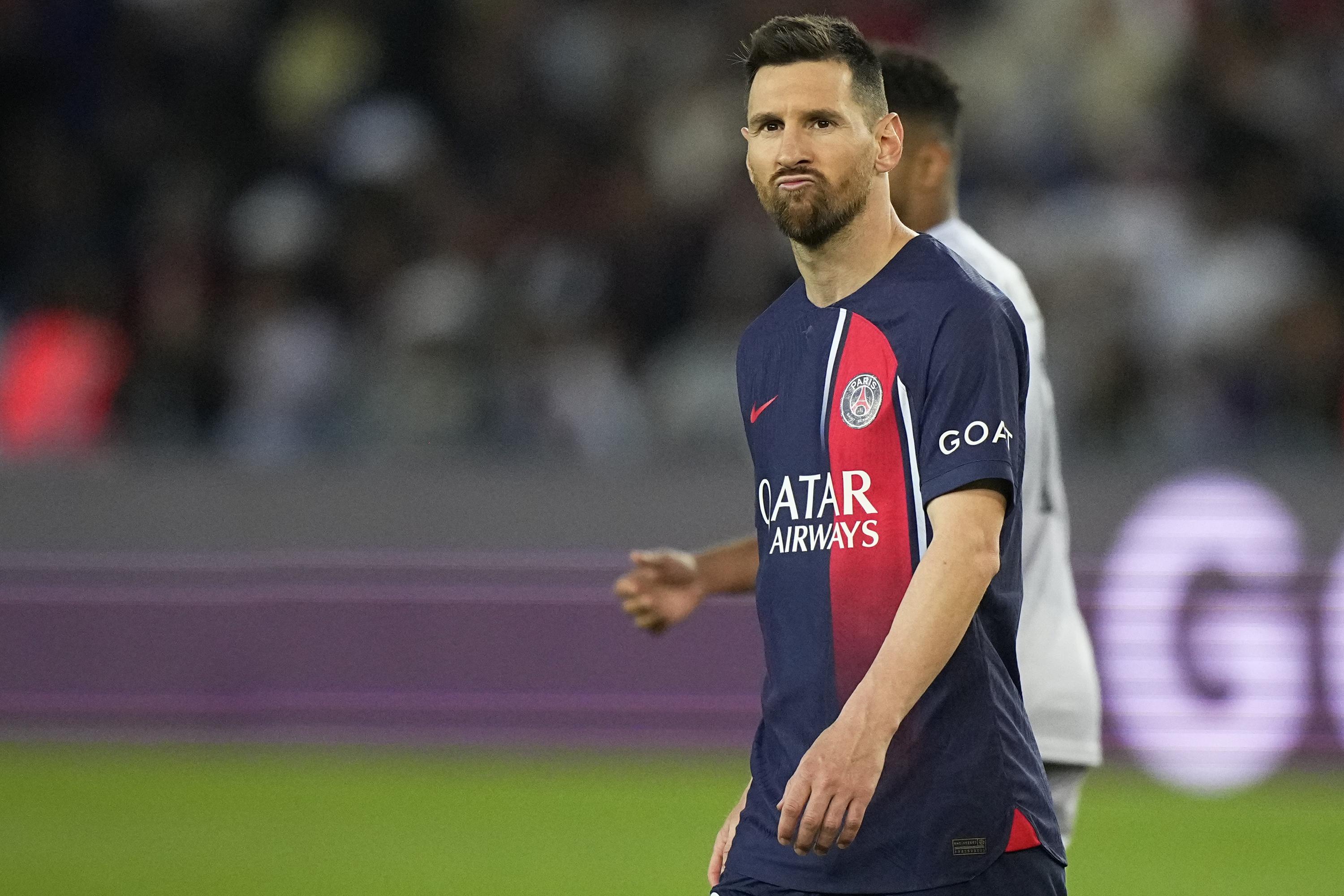 Messi's father says player 'would like to return' to Barcelona amid  speculation over Saudi move | AP News