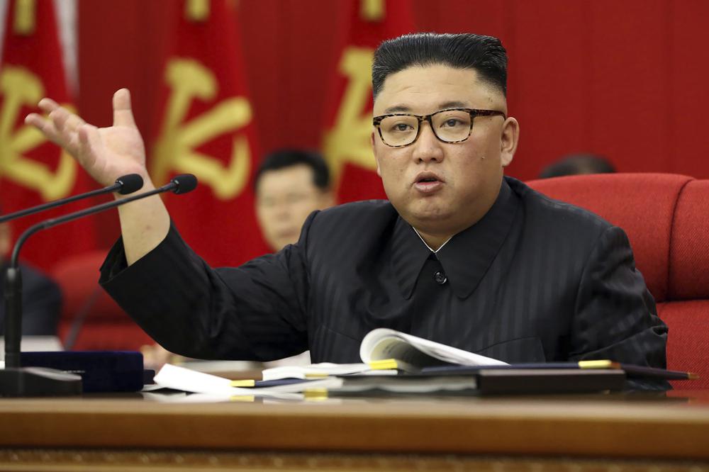 In this photo provided by the North Korean government, North Korean leader Kim Jong Un speaks during a Workers' Party meeting in Pyongyang, North Korea, Tuesday, June 15, 2021. Kim warned about possible food shortages and called for his people to brace for extended COVID-19 restrictions as he opened a major political conference to discuss national efforts to salvage a broken economy.  the North's official Korean Central News Agency said Wednesday, June 16, 2021. Independent journalists were not given access to cover the event depicted in this image distributed by the North Korean government.  The content of this image is as provided and cannot be independently verified.  (Korean Central News Agency/Korea News Service via AP)