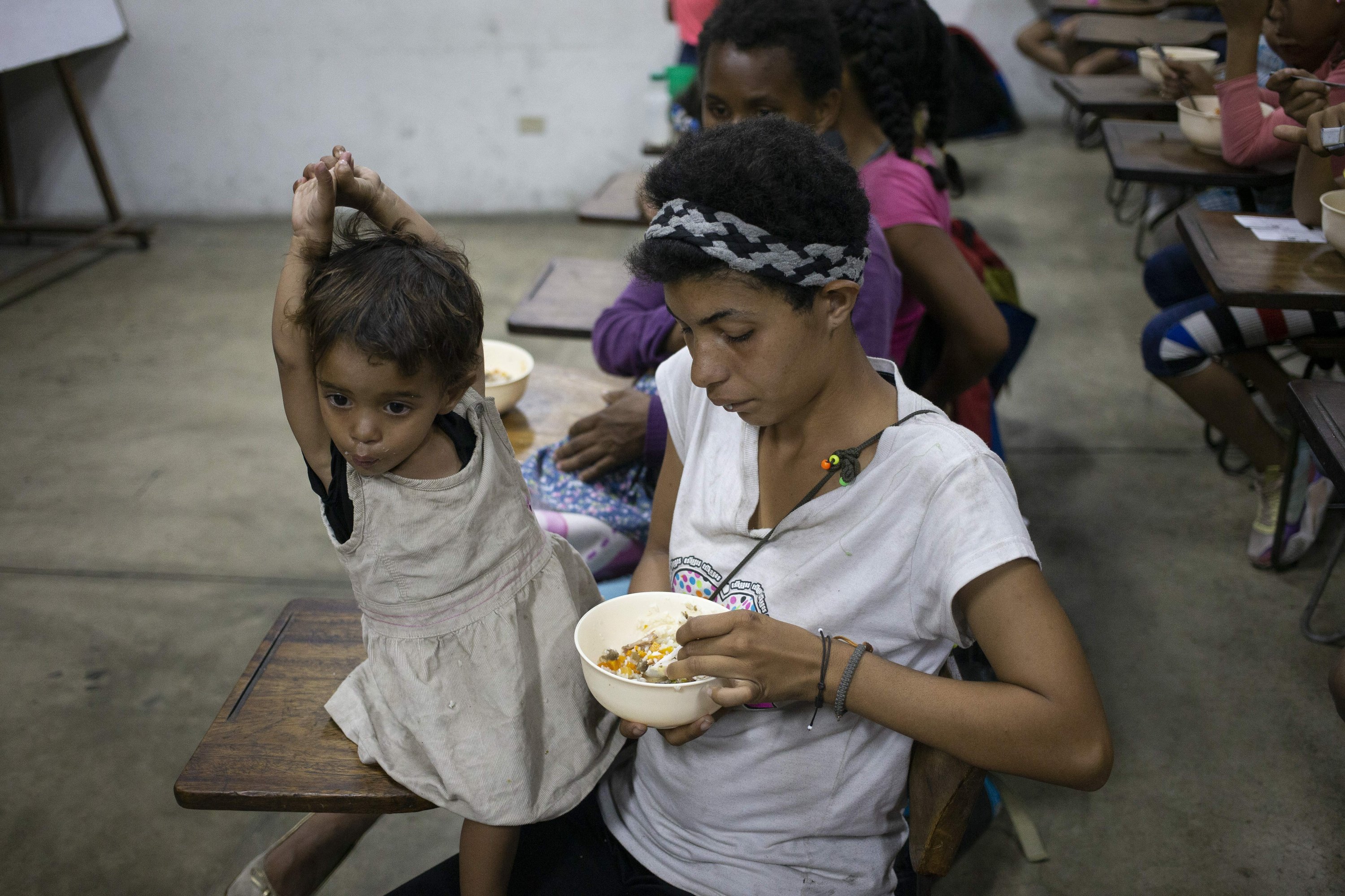 Many Venezuelans struggle to put food on the table in crisis AP News