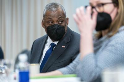 Secretary of Defense Lloyd Austin appears during a meeting with Singapore's Prime Minister Lee Hsien Loong at the Pentagon, Monday, March 28, 2022, in Washington. (AP Photo/Andrew Harnik)