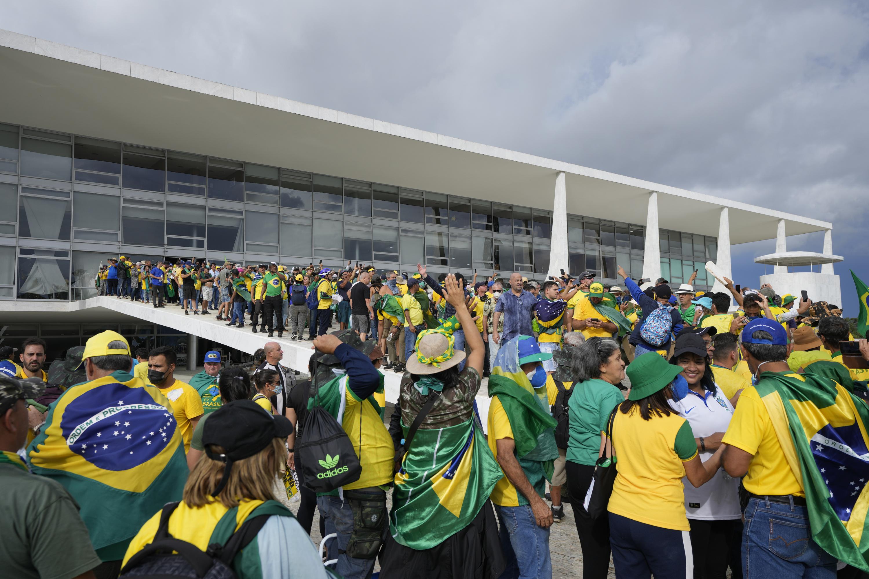 Supporters of Brazil's Bolsonaro stage huge demonstration to defend him  amid investigations