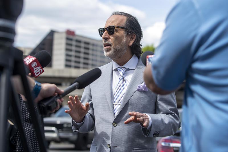 FILE - Attorney Drew Findling makes remarks regarding his client, Clayton County Sheriff Victor Hill, during a news conference outside of the Richard B. Russell Federal building in Atlanta on April 27, 2021. Findling's firm said in a statement Thursday, Aug. 11, 2022, that it is representing former President Donald Trump along with two other attorneys. Trump has hired the prominent Atlanta criminal defense attorney to represent him in matters related to the special grand jury that is investigating whether the former president illegally tried to interfere with the 2020 election in Georgia. (Alyssa Pointer/Atlanta Journal-Constitution via AP, File)