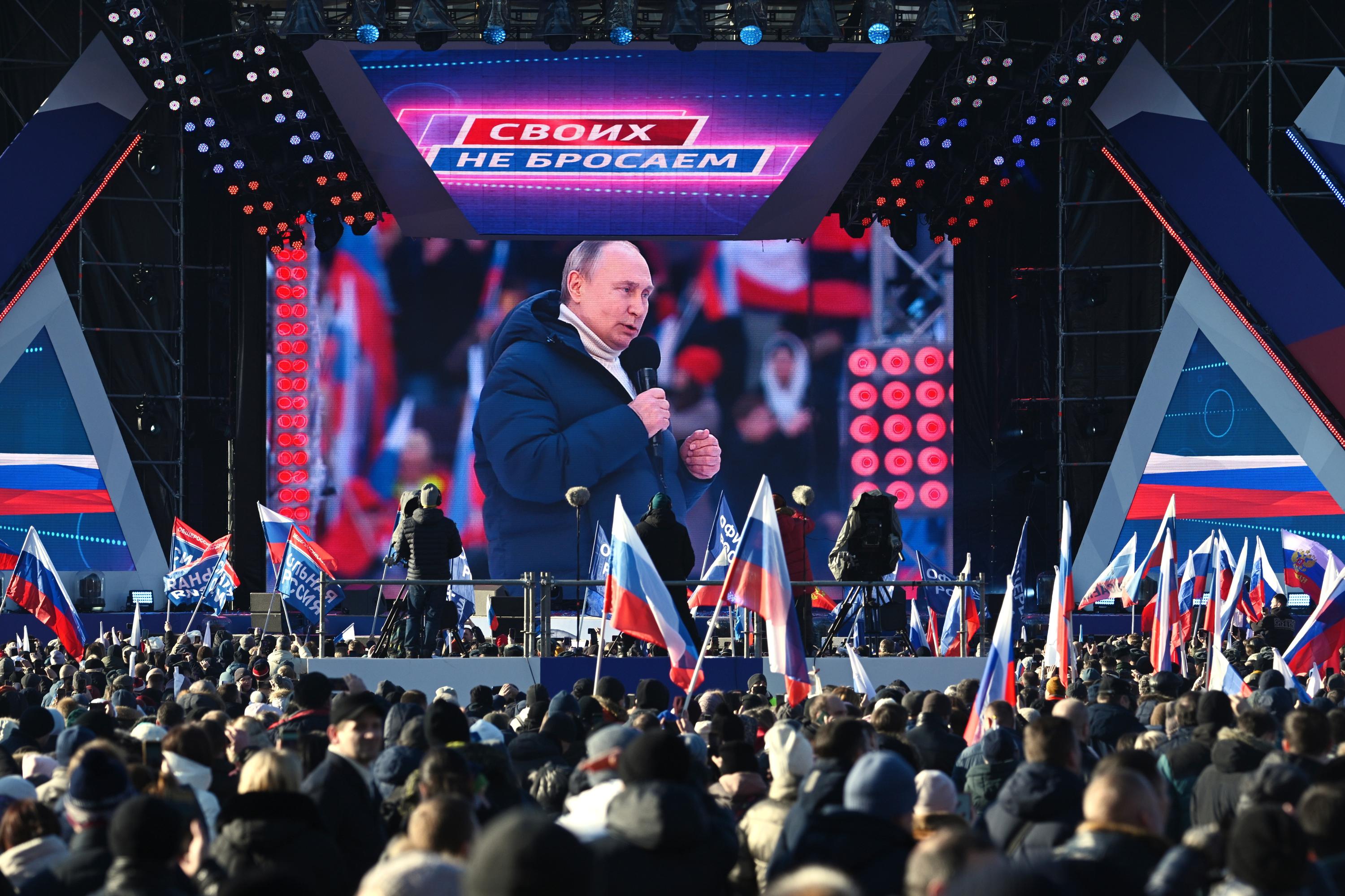 Putin appears at big rally as troops press attack in Ukraine | AP News