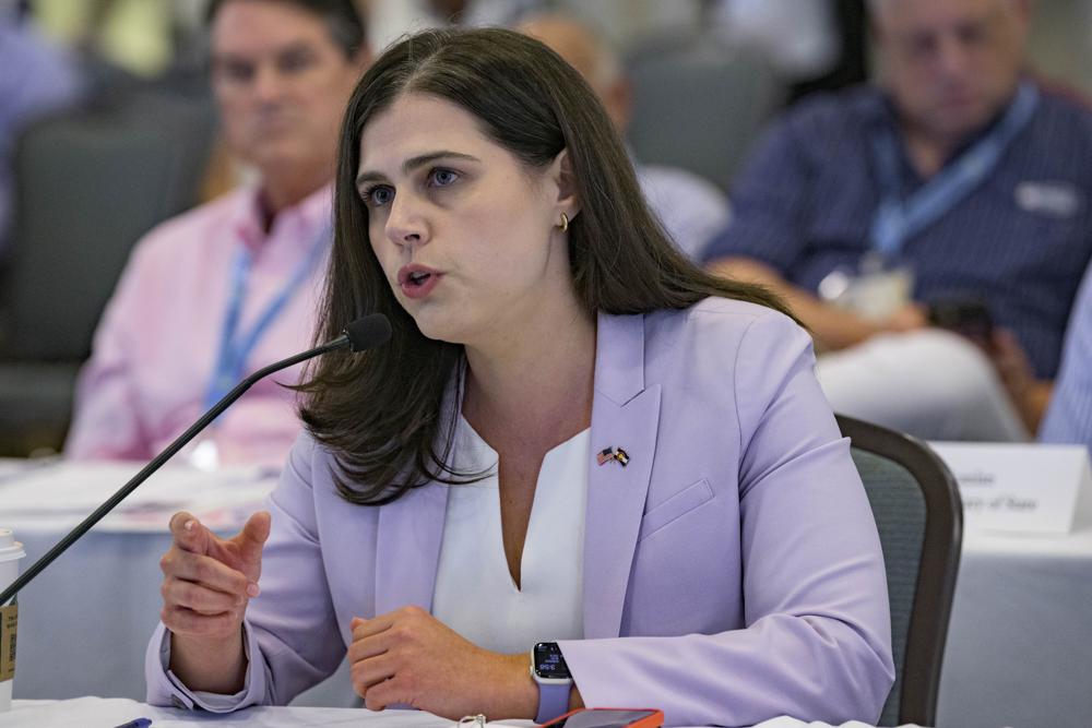 FILE - Colorado Secretary of State Jena Griswold speaks during a committee meeting in Baton Rouge, La., July 8, 2022. Colorado's secretary of state's office says it mistakenly sent postcards to about 30,000 non-U.S. citizens encouraging them to register to vote. It blames the error on a database glitch and insists anyone who is not a citizen and tries to register will not be able to. (AP Photo/Matthew Hinton, File)