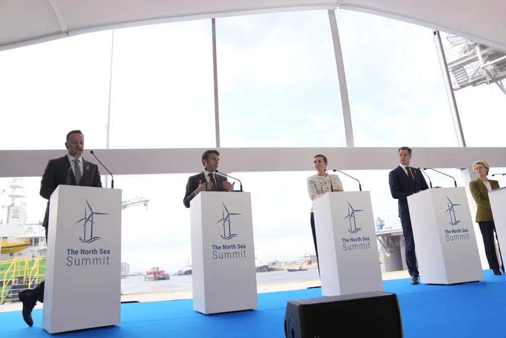From left, Ireland's Prime Minister Leo Varadkar, French President Emmanuel Macron, Denmark's Prime Minister Mette Frederiksen, Belgium's Prime Minister Alexander De Croo and European Commission President Ursula von der Leyen participate in a media conference at the North Sea Summit in Ostend, Belgium, Monday, April 24, 2023. Nine Western European leaders on Monday are gathering with the hopes of ramping up the production of clean energy from wind turbines in the North Sea to both meet climate targets and reduce their strategic energy dependence on Russia. (AP Photo/Virginia Mayo)
