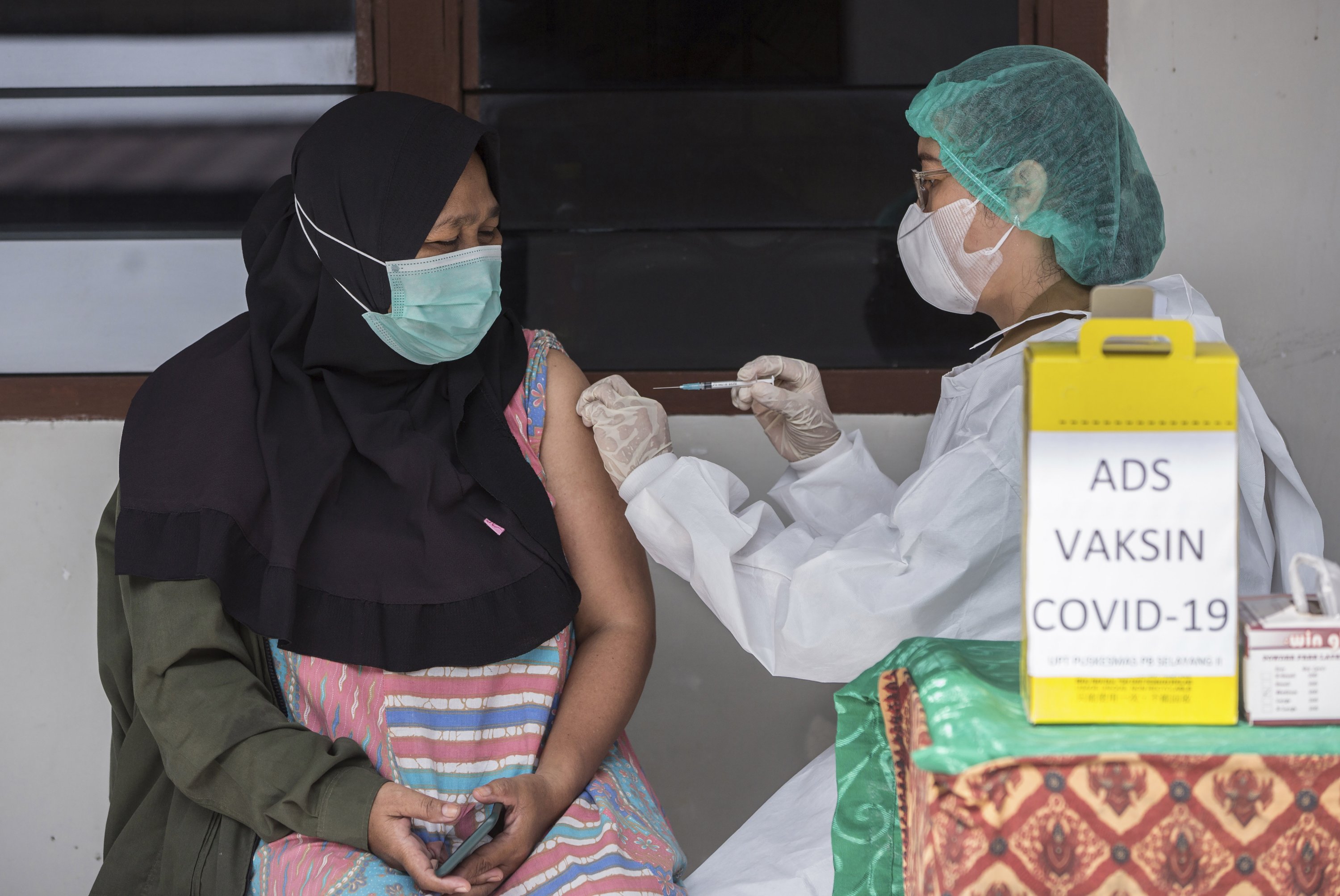 Indonesia's confirmed coronavirus cases exceed 1 million AP News